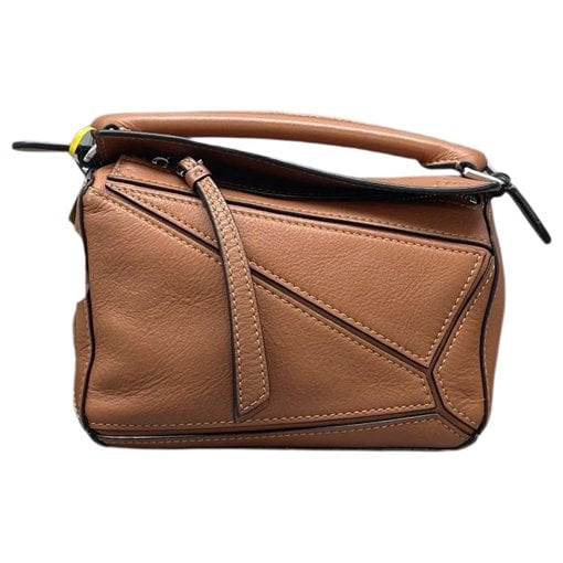 Puzzle leather handbag