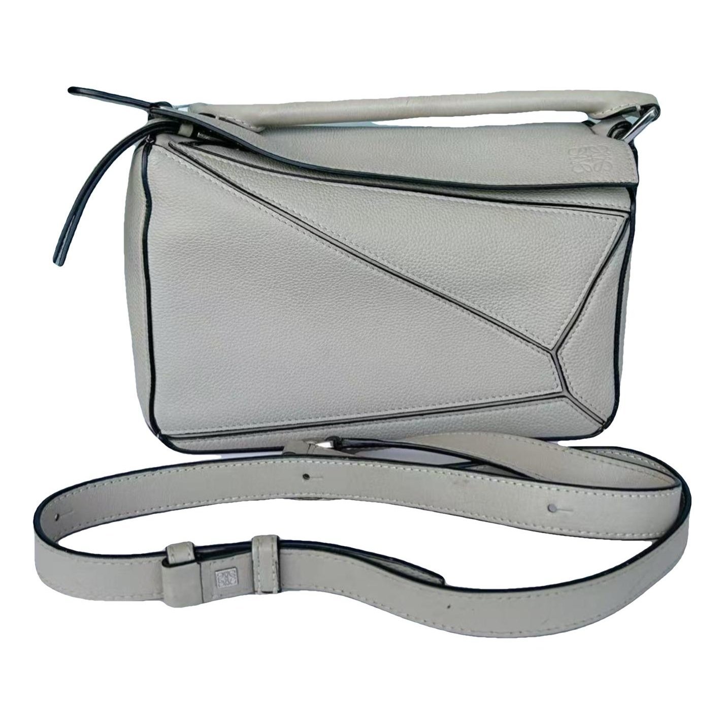 Puzzle leather handbag
