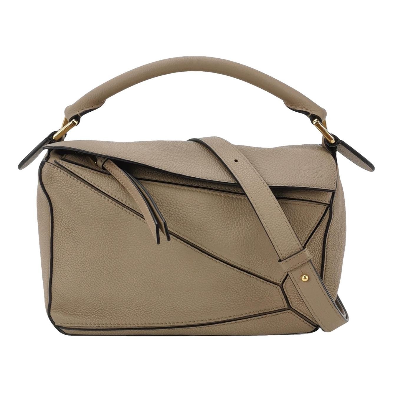 Puzzle leather handbag