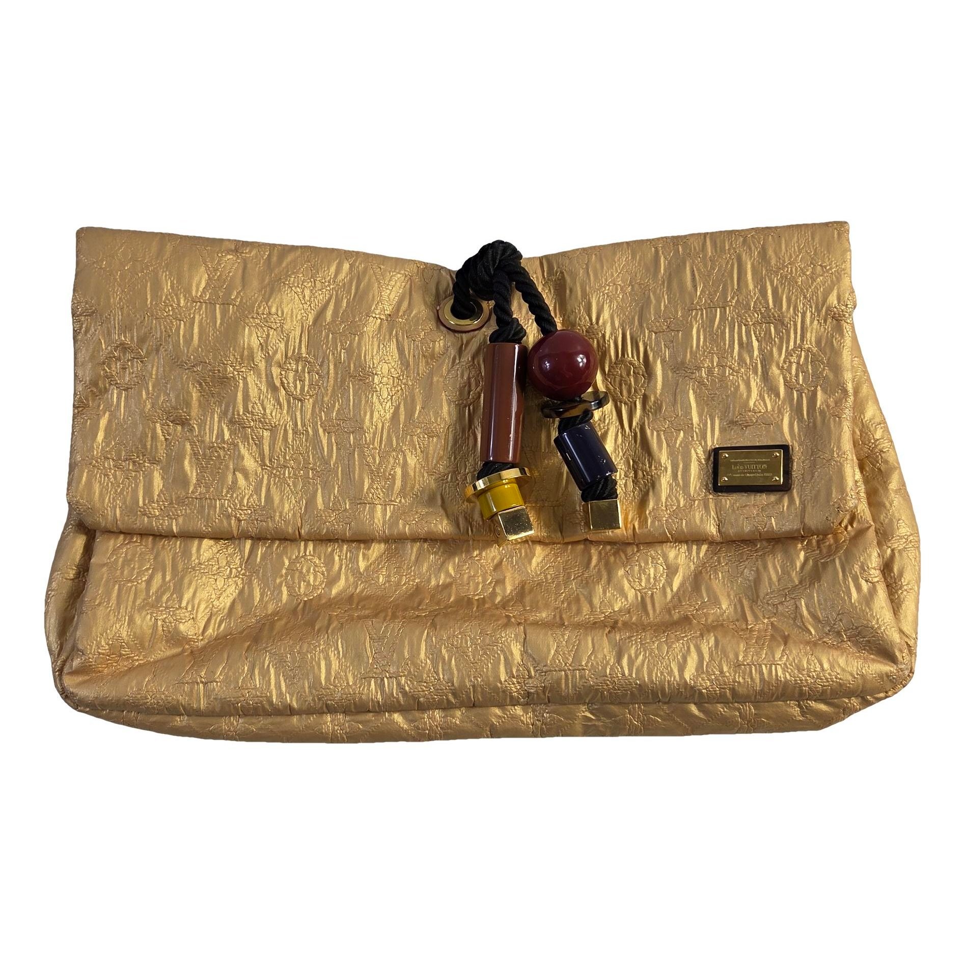 Louis Vuitton Limelight silk clutch bag