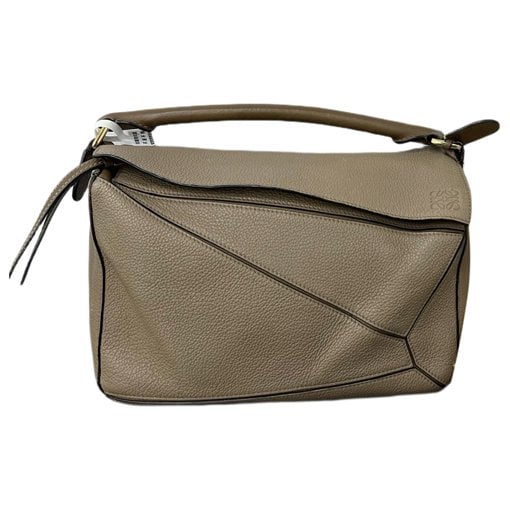 Puzzle leather handbag
