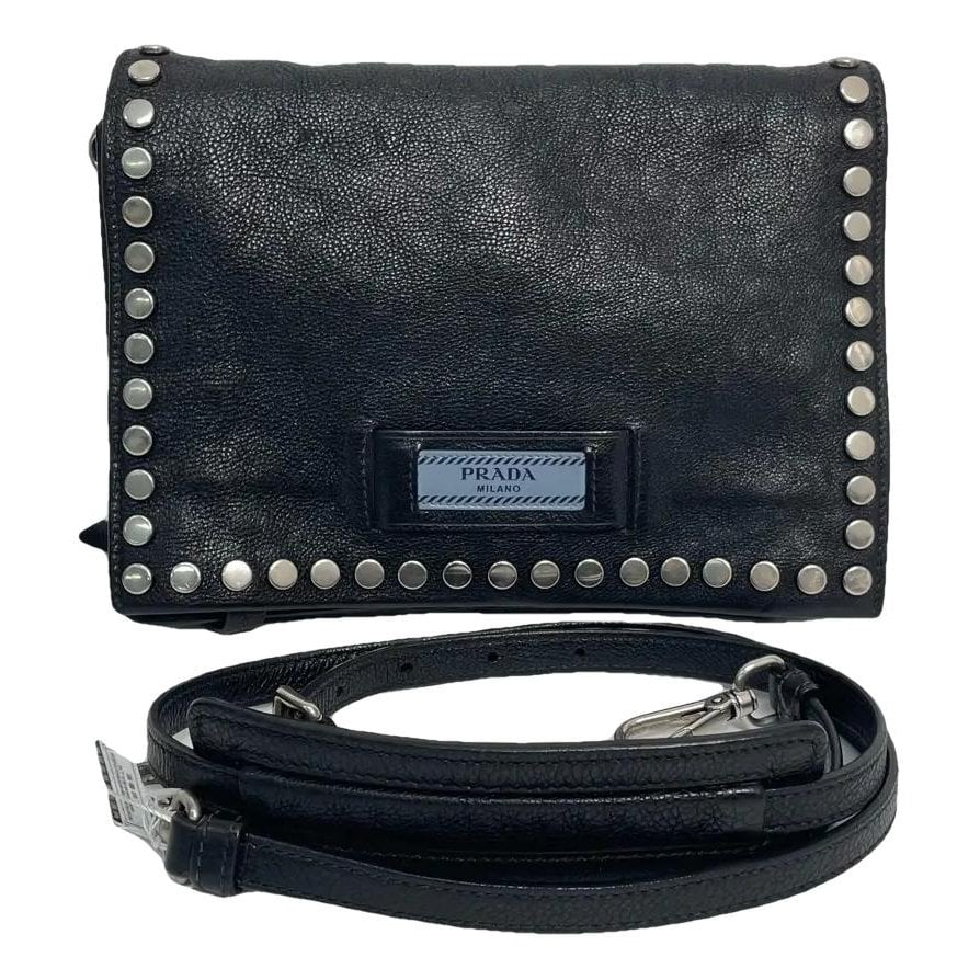 Etiquette leather handbag