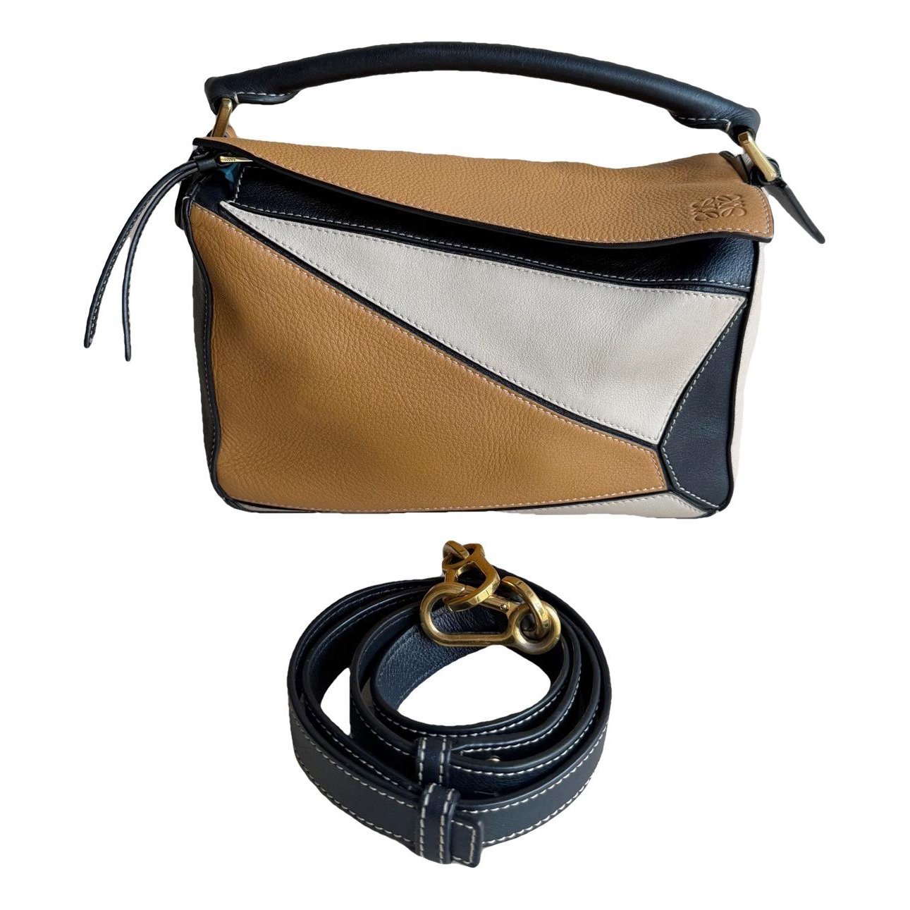 Puzzle leather handbag