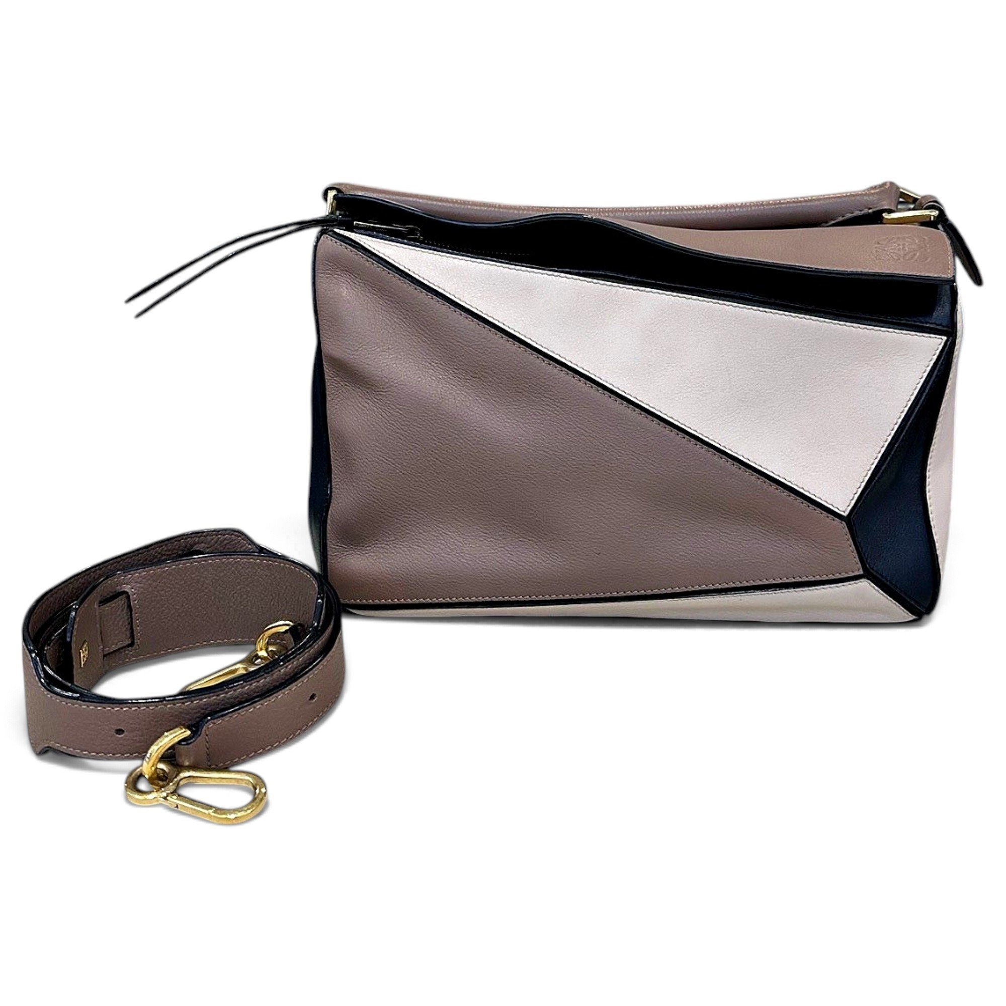 Puzzle leather handbag