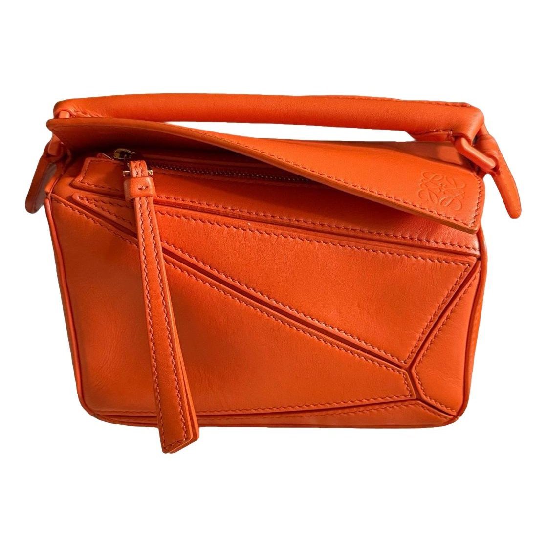 Puzzle leather handbag