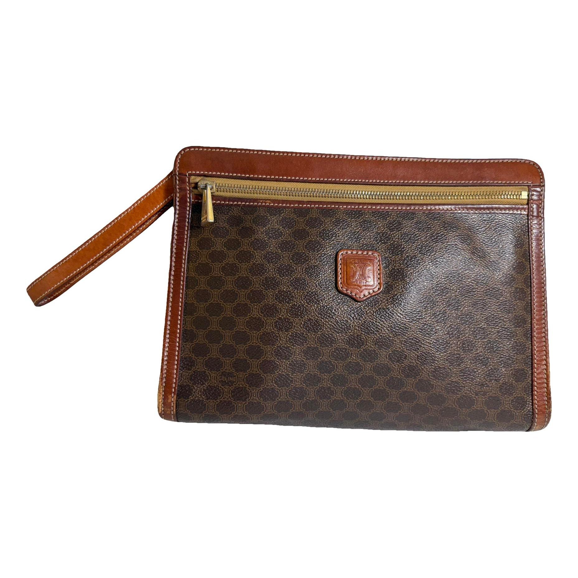 Triomphe Vintage leather clutch bag