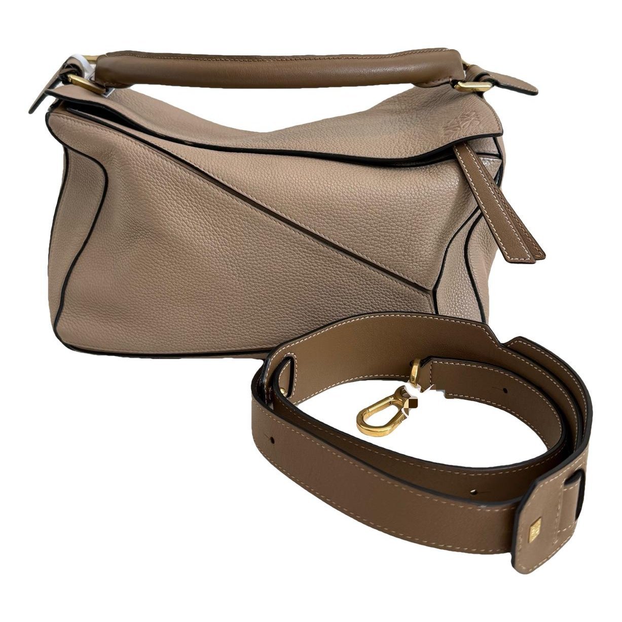 Puzzle leather handbag