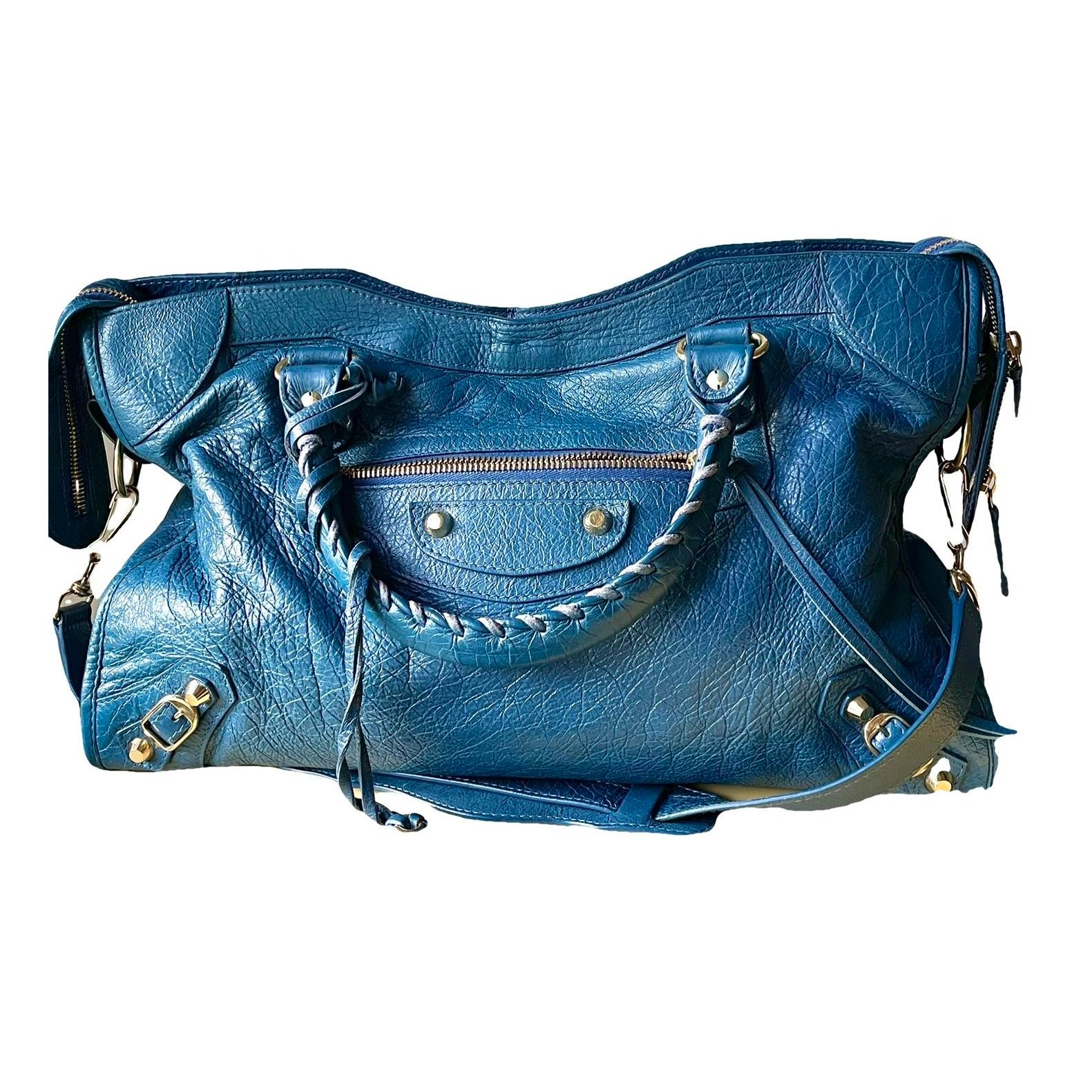 First leather handbag
