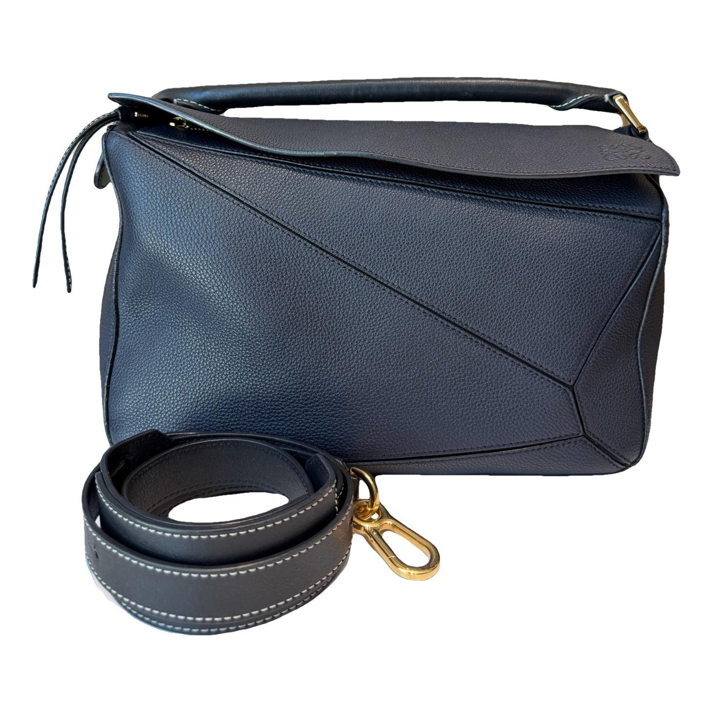 Puzzle leather handbag