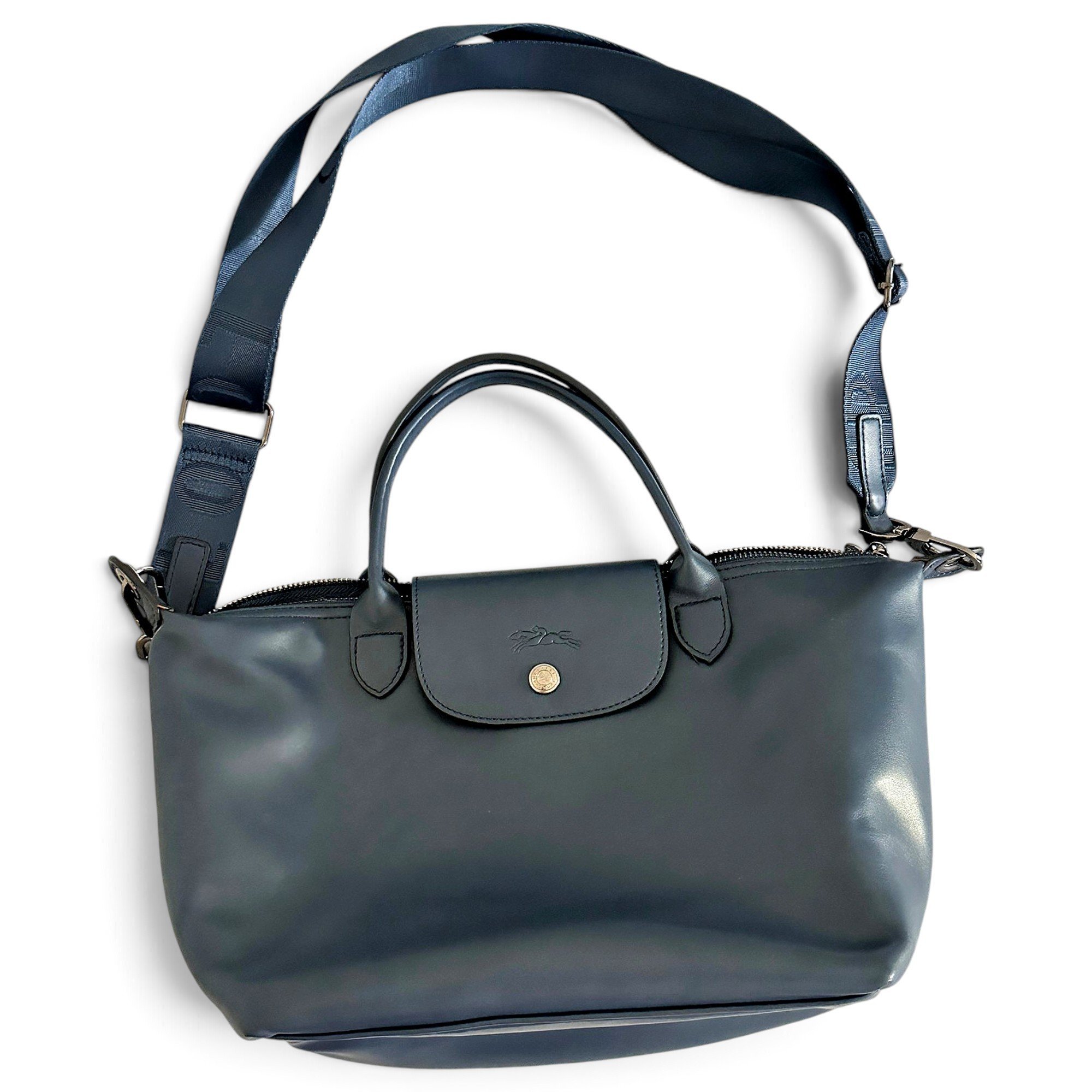Pliage leather clutch bag