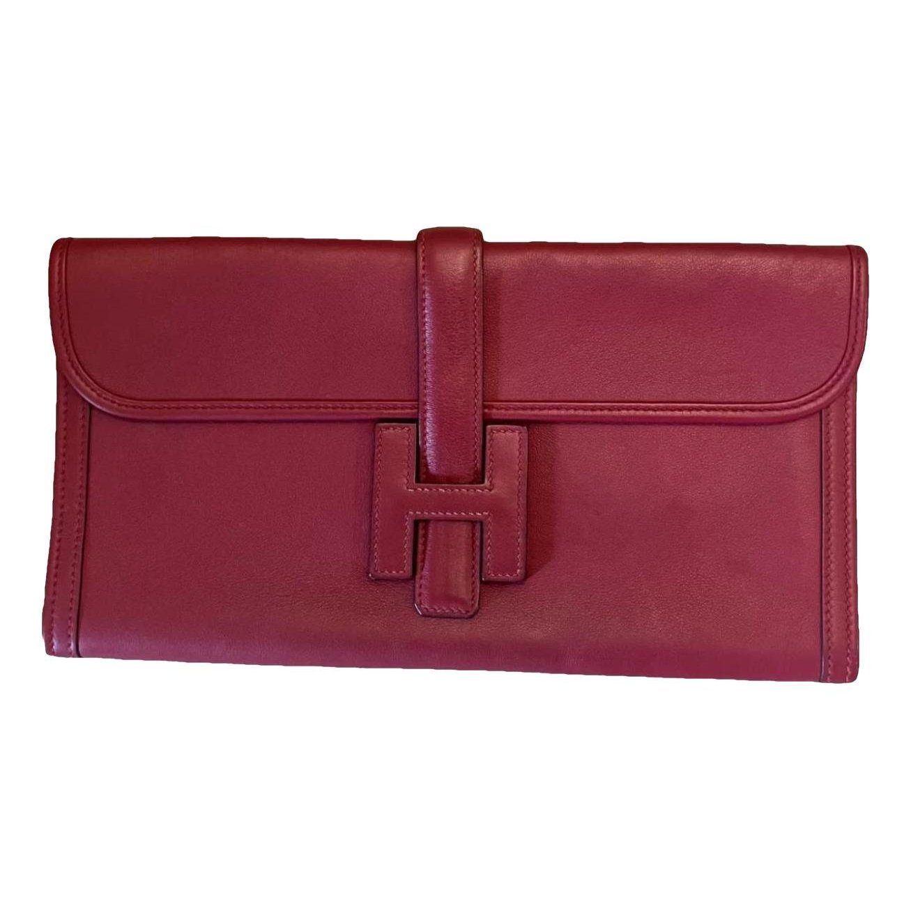 Jige leather clutch bag