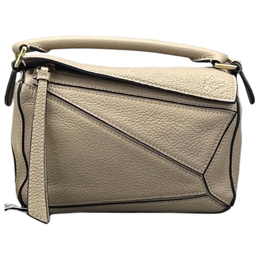 Puzzle leather handbag