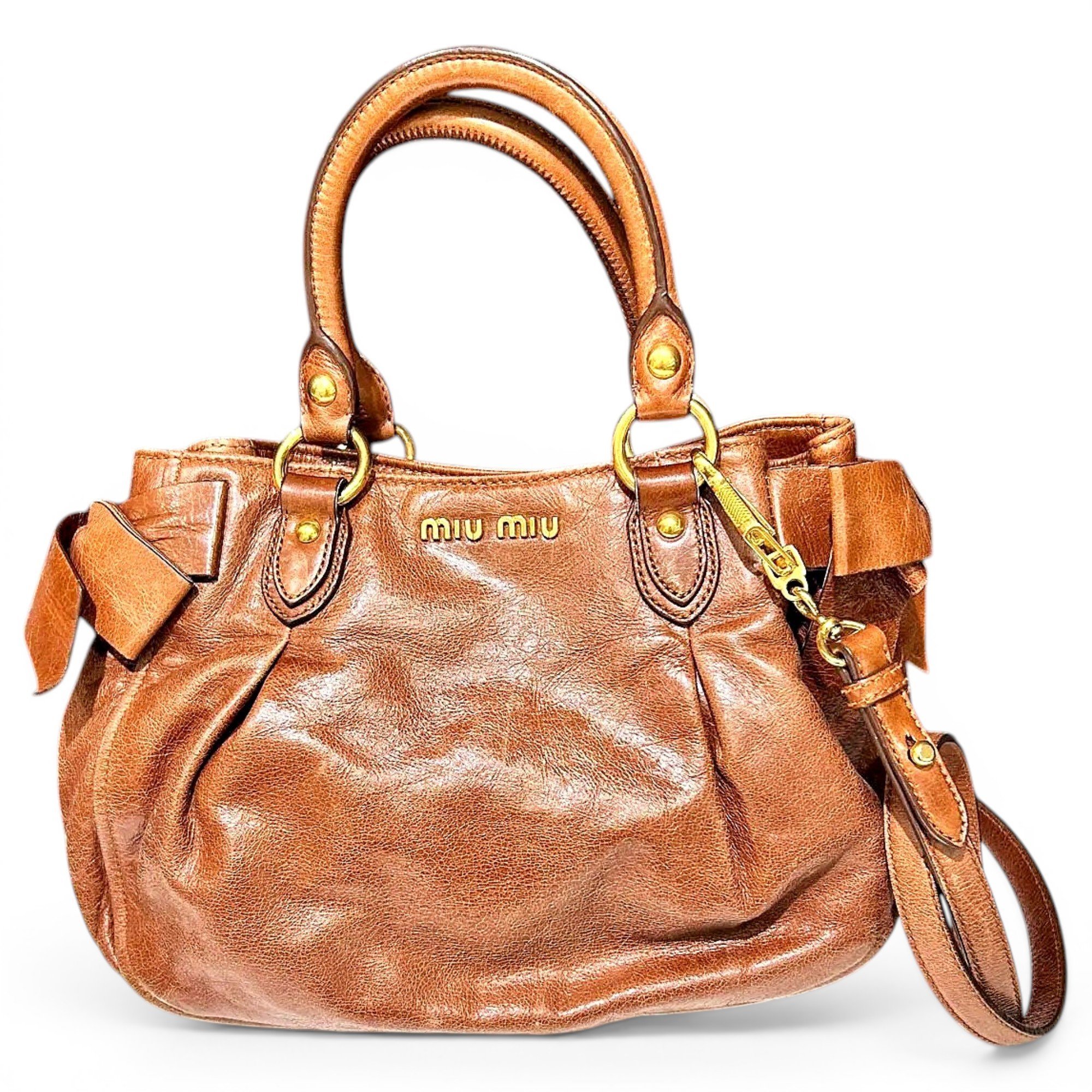 Bow bag leather handbag