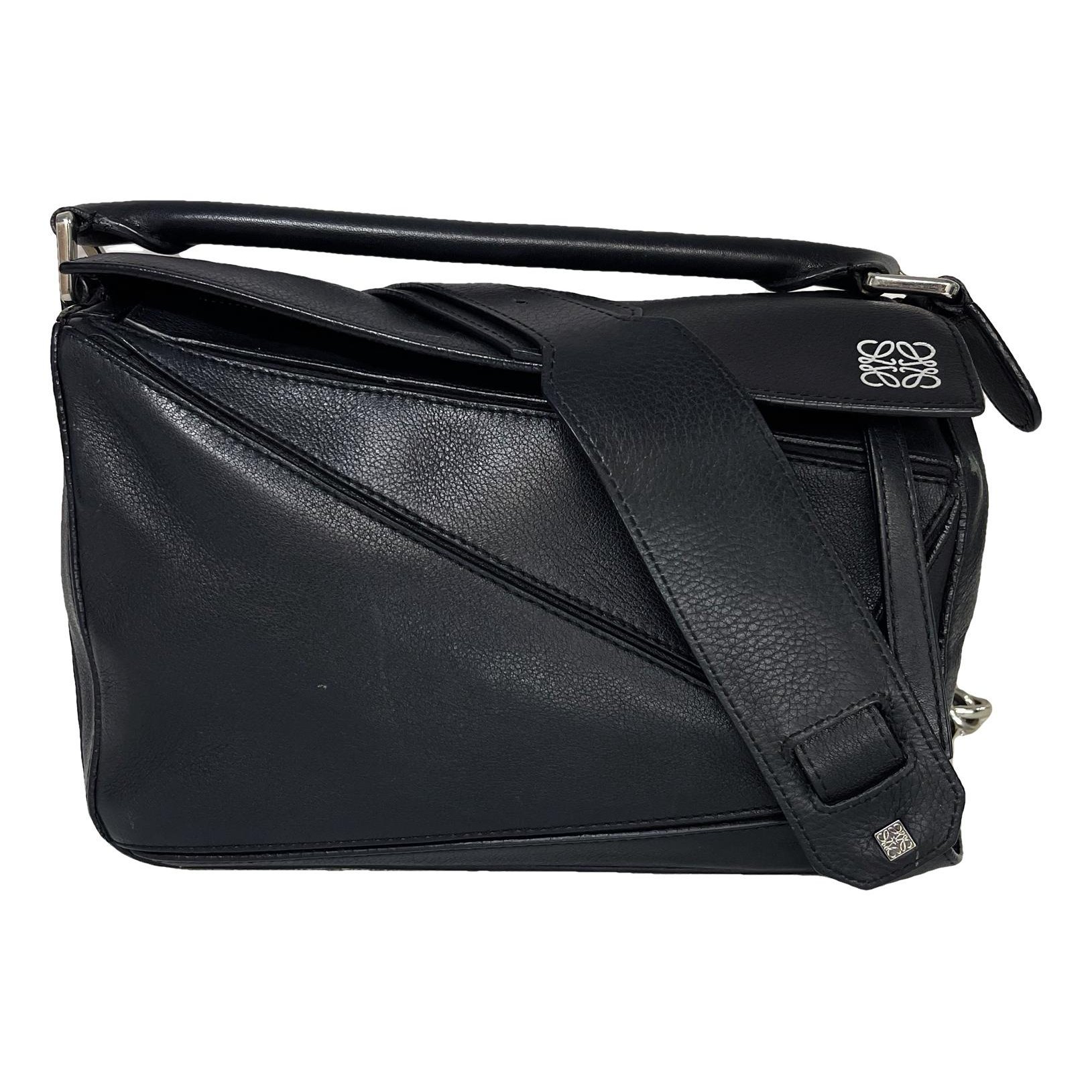 Puzzle leather handbag