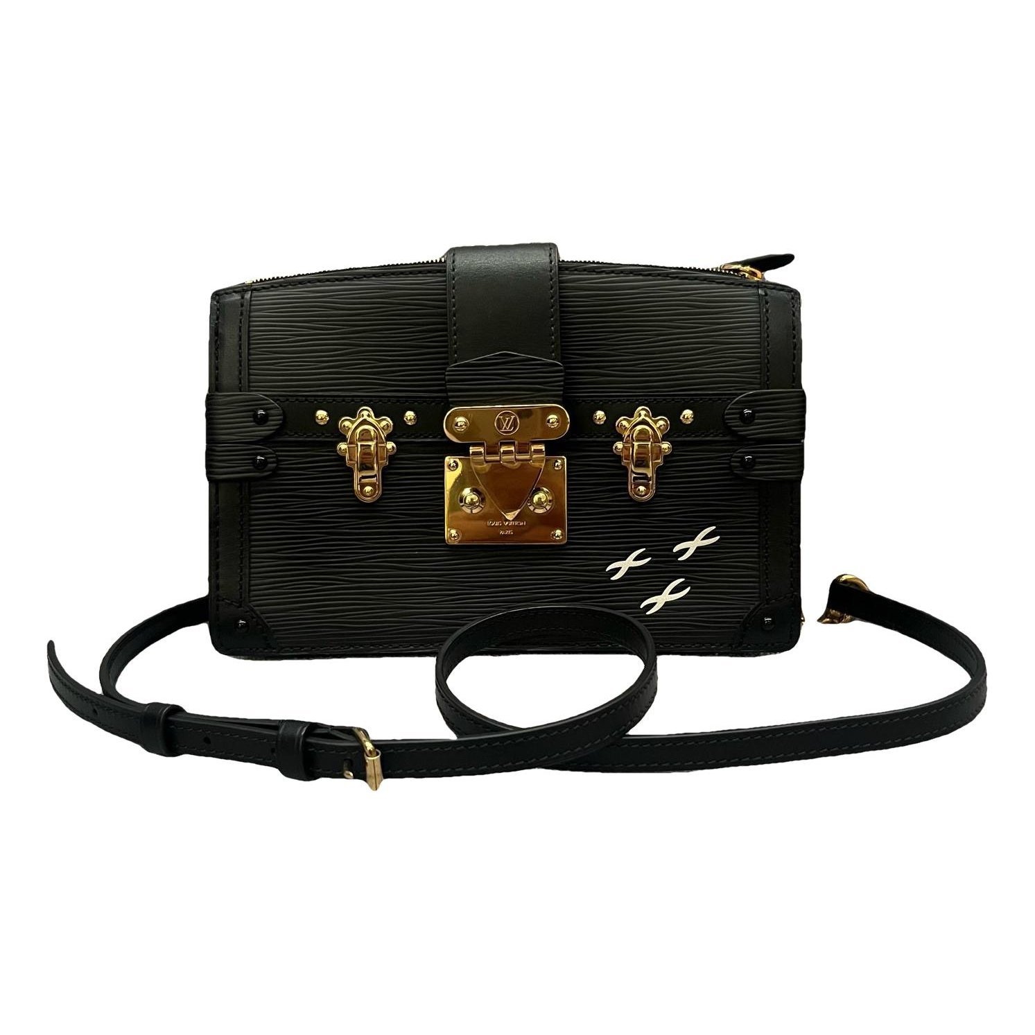 Pochette Trunk leather handbag