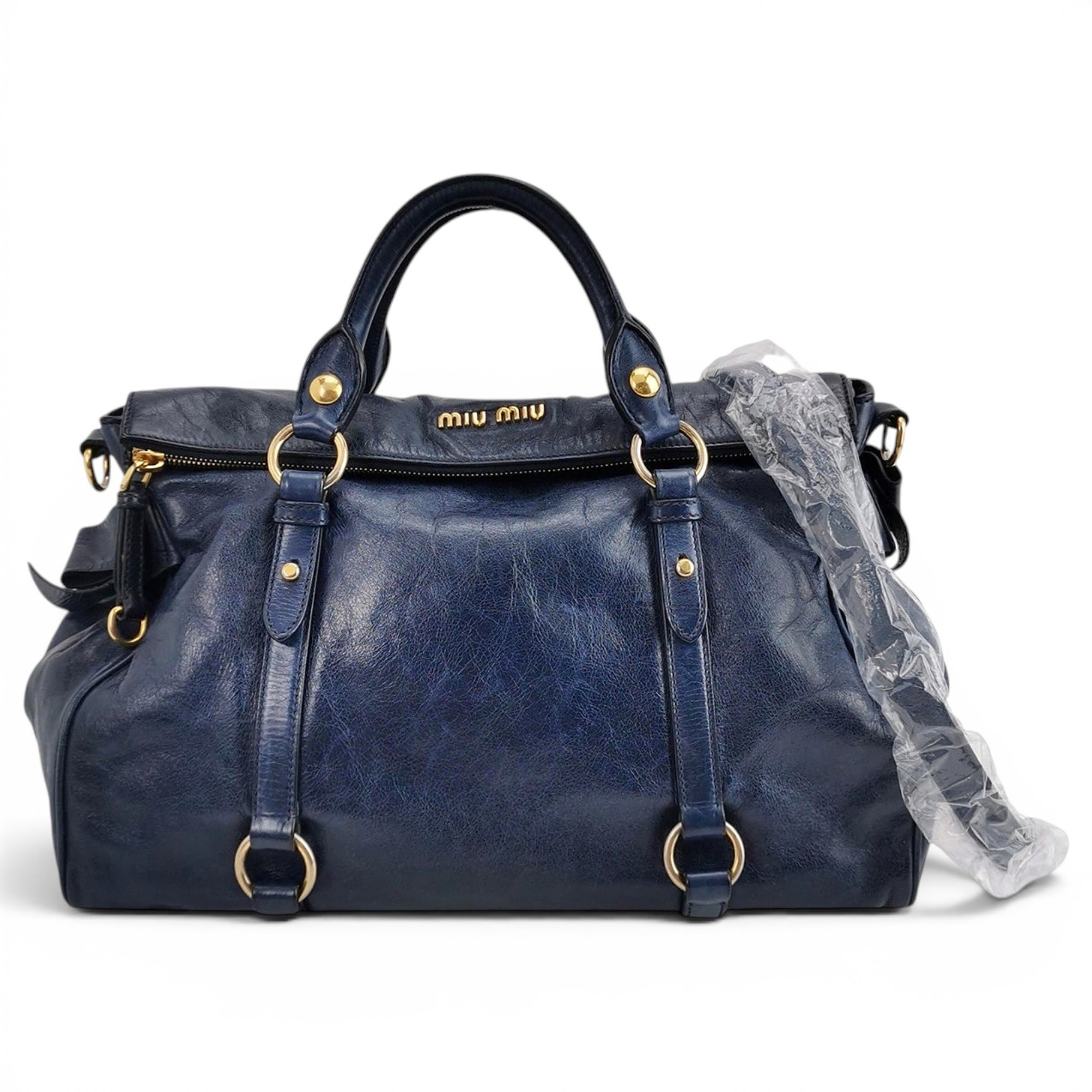 Bow bag leather handbag