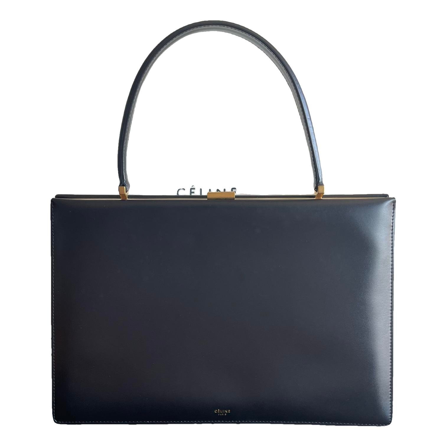 Clasp leather handbag