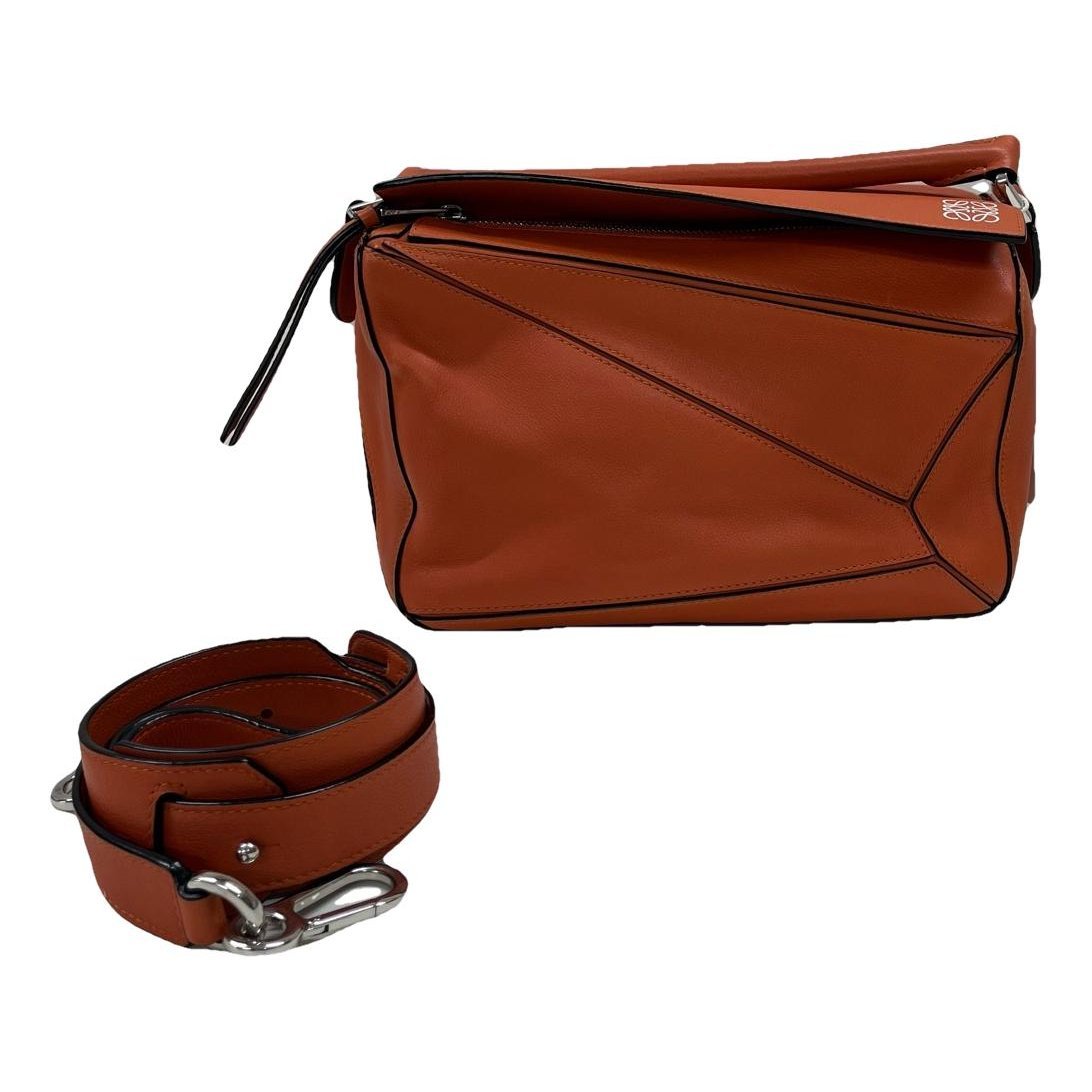 Puzzle leather handbag