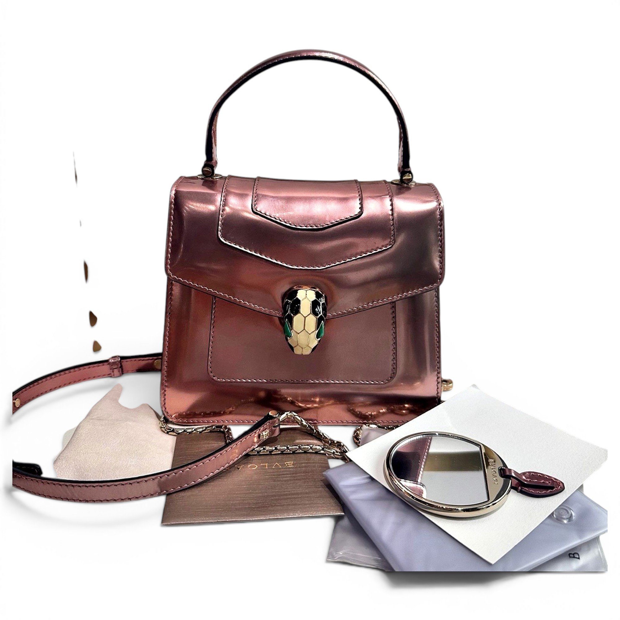Serpenti leather handbag