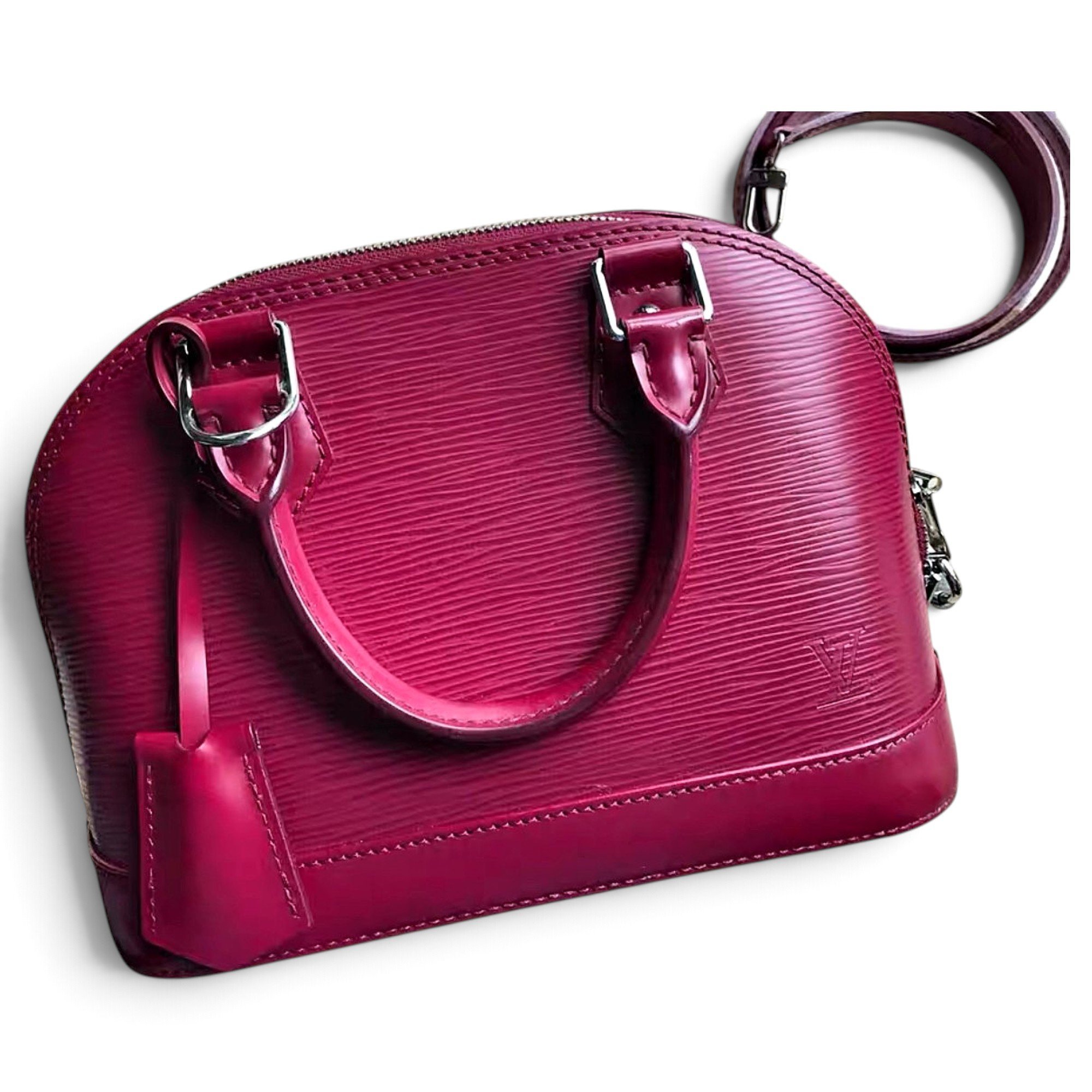Louis Vuitton Alma BB leather handbag