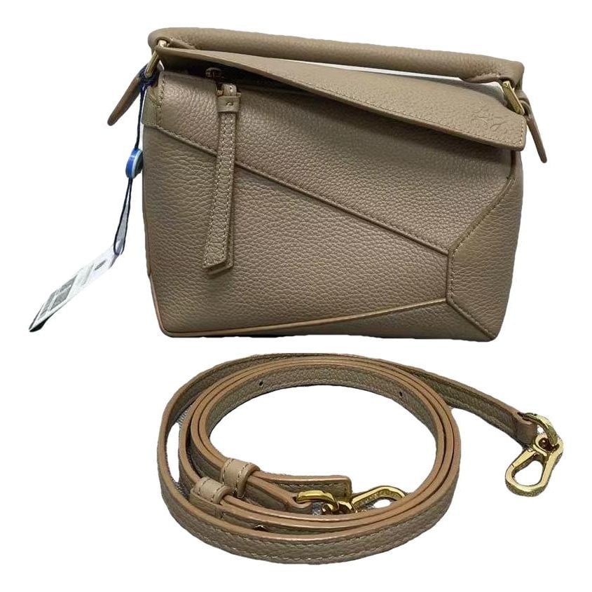 Puzzle leather crossbody bag