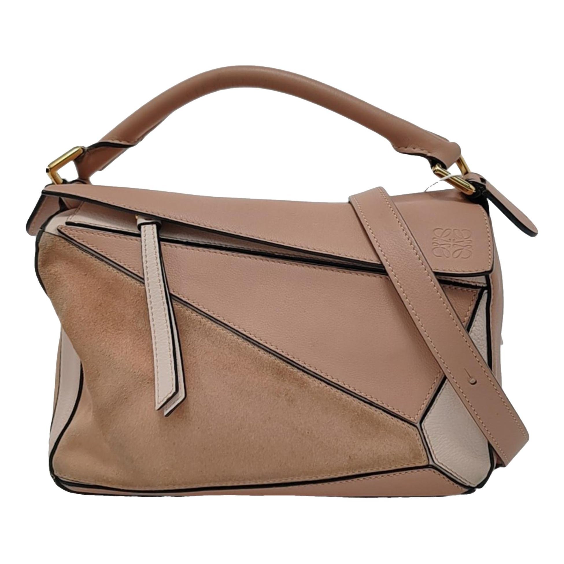 Puzzle leather handbag