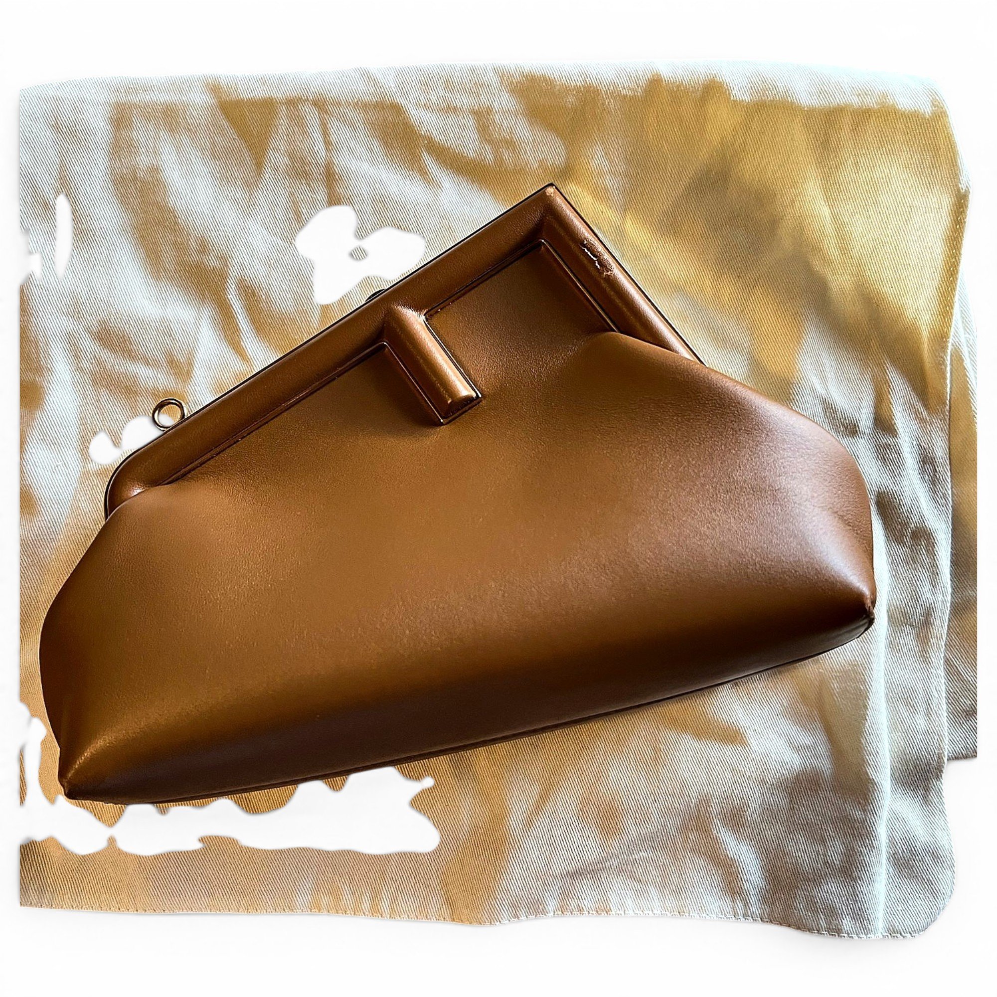 First leather handbag