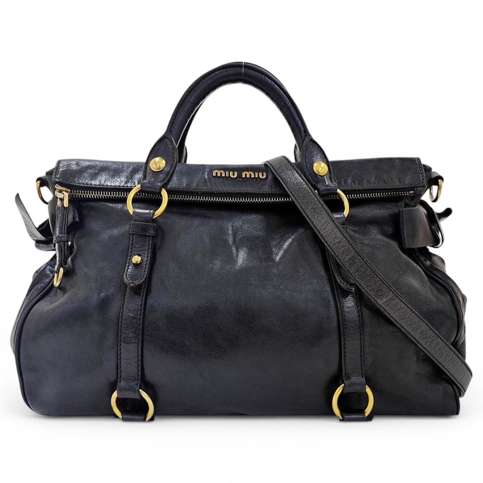 Bow bag leather handbag