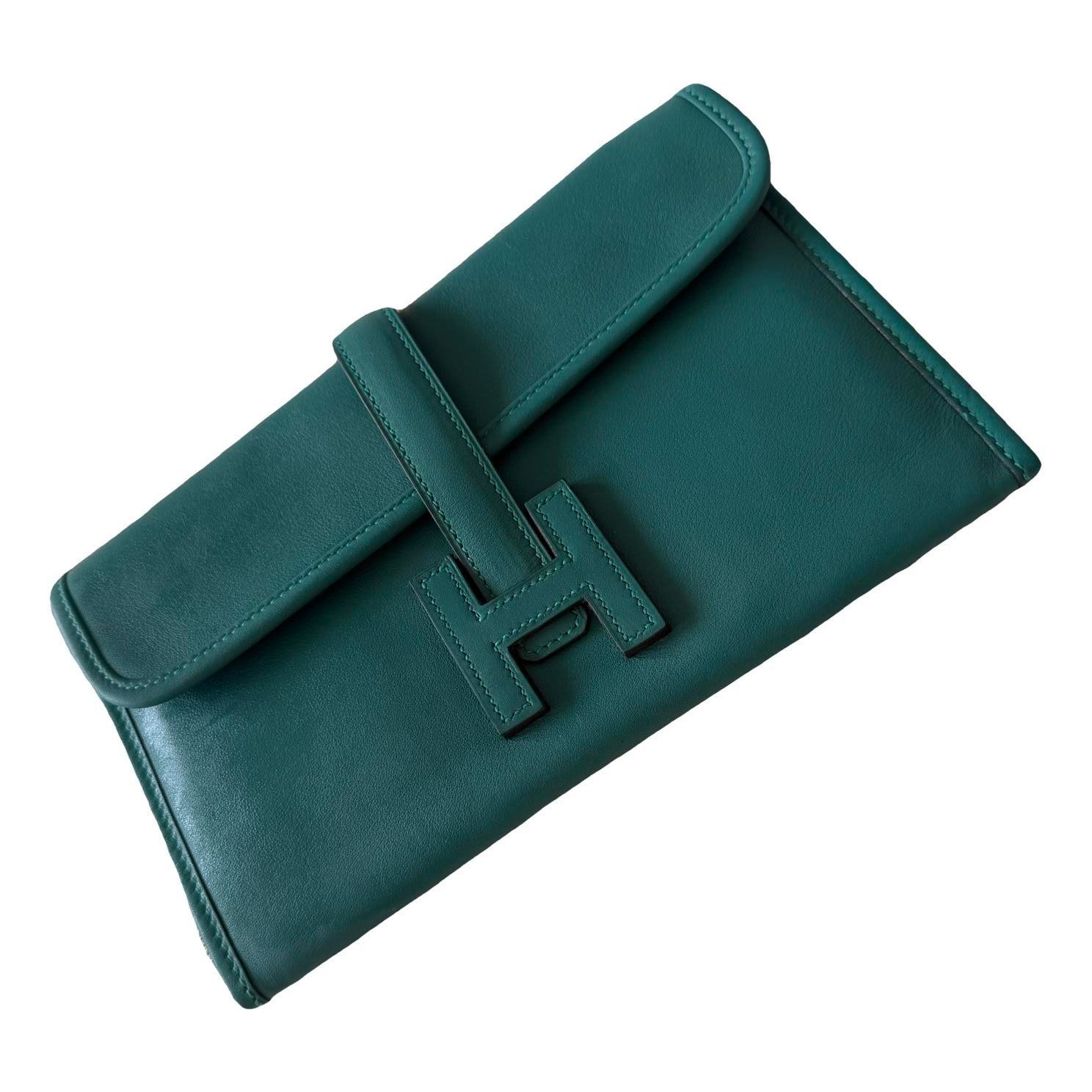Jige leather clutch bag