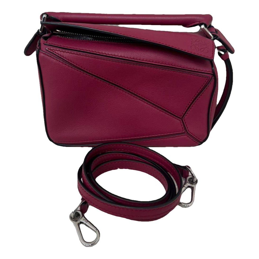 Puzzle leather crossbody bag