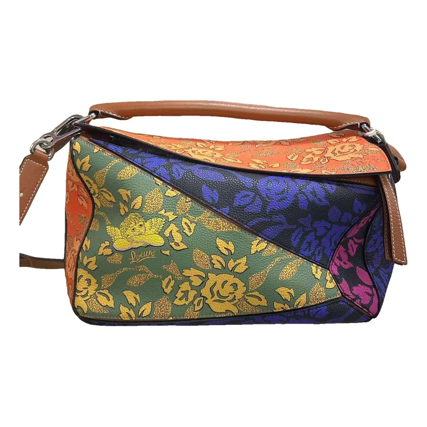 Puzzle leather handbag