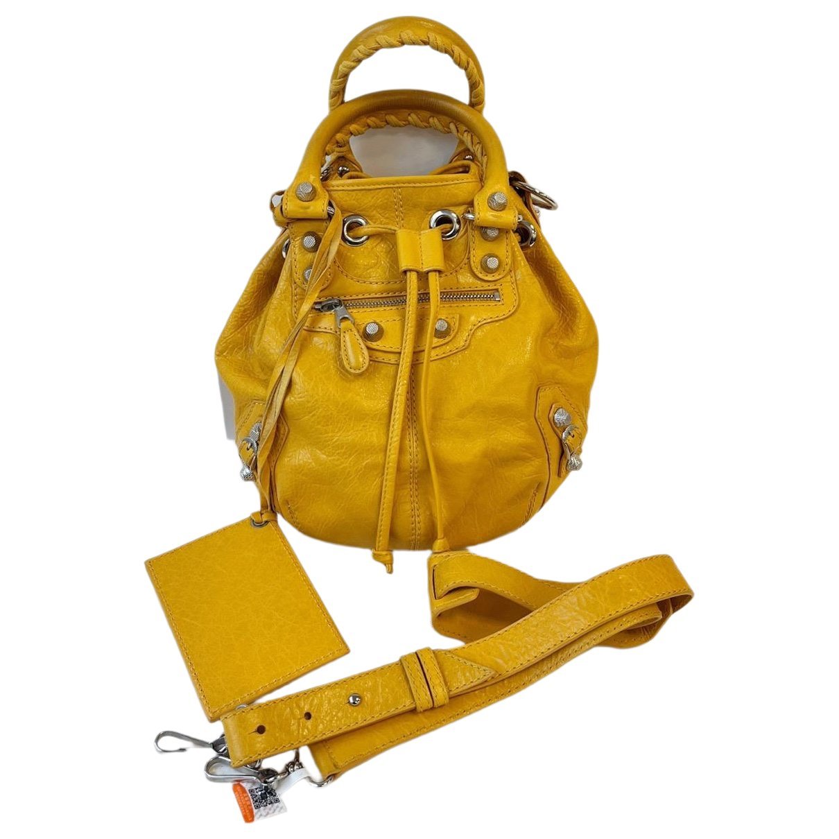 Pompon leather handbag