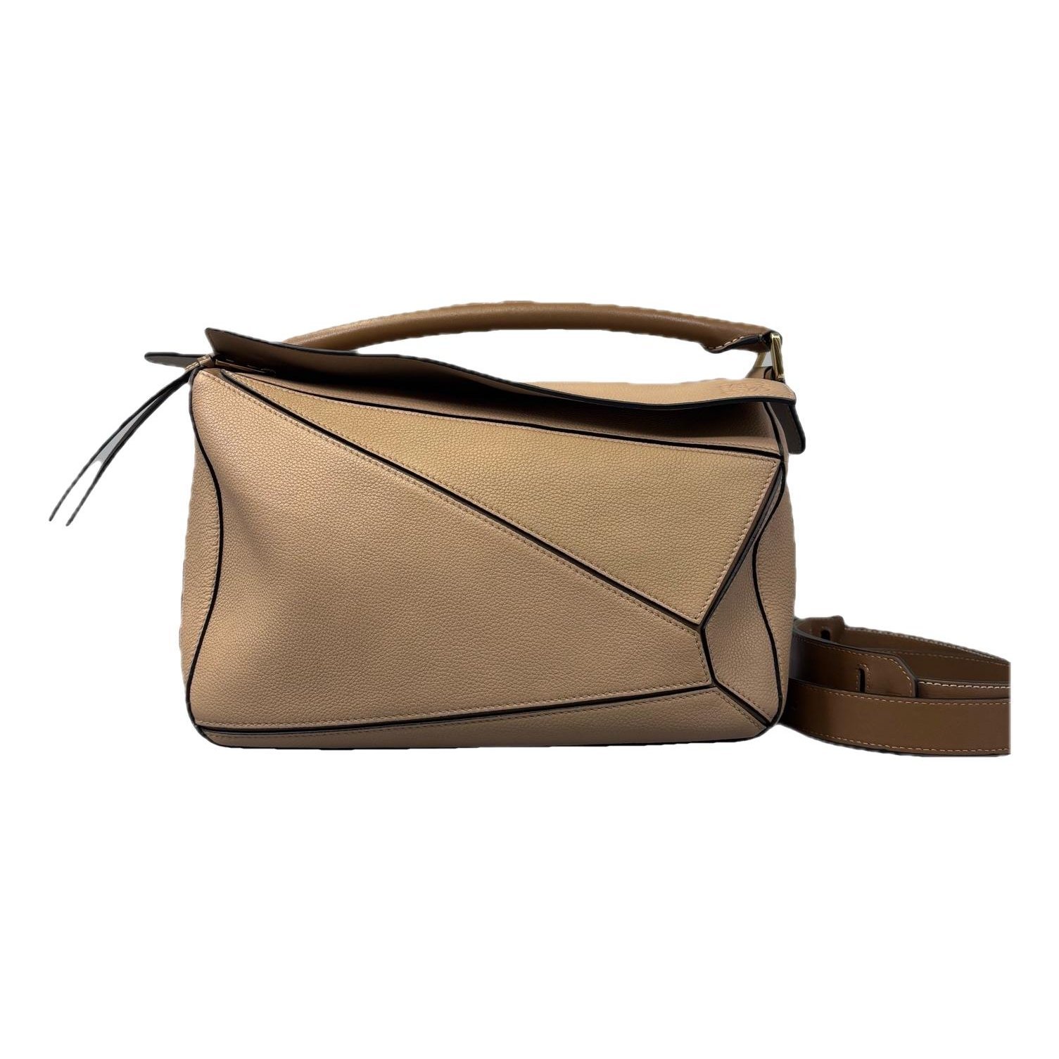 Puzzle leather handbag