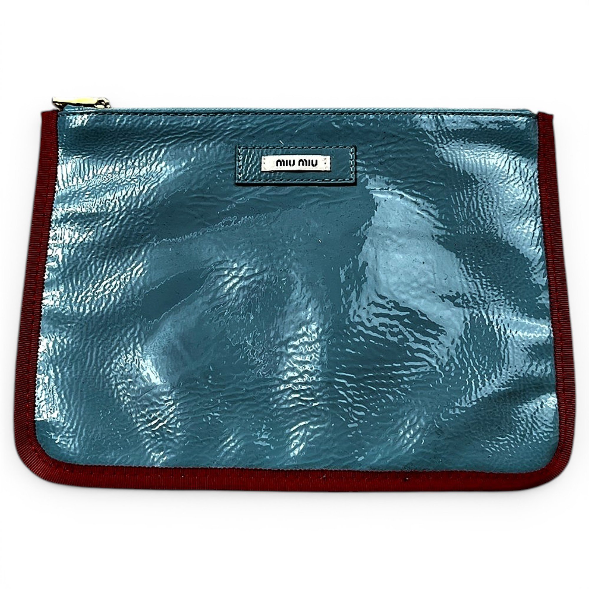 Patent leather clutch bag