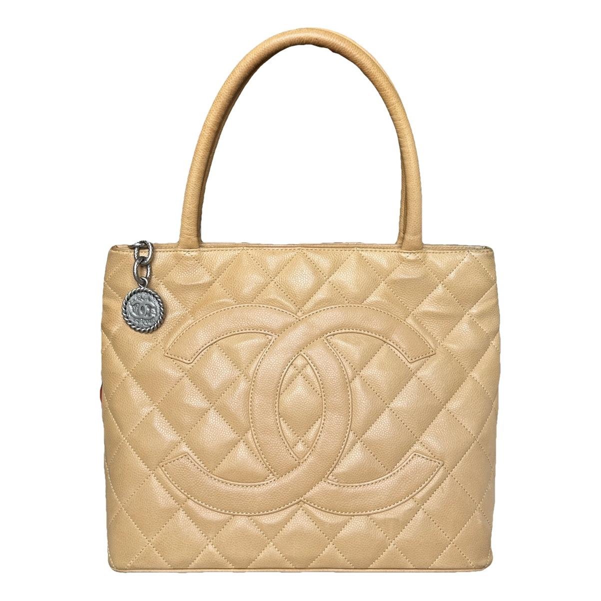 Médaillon leather handbag