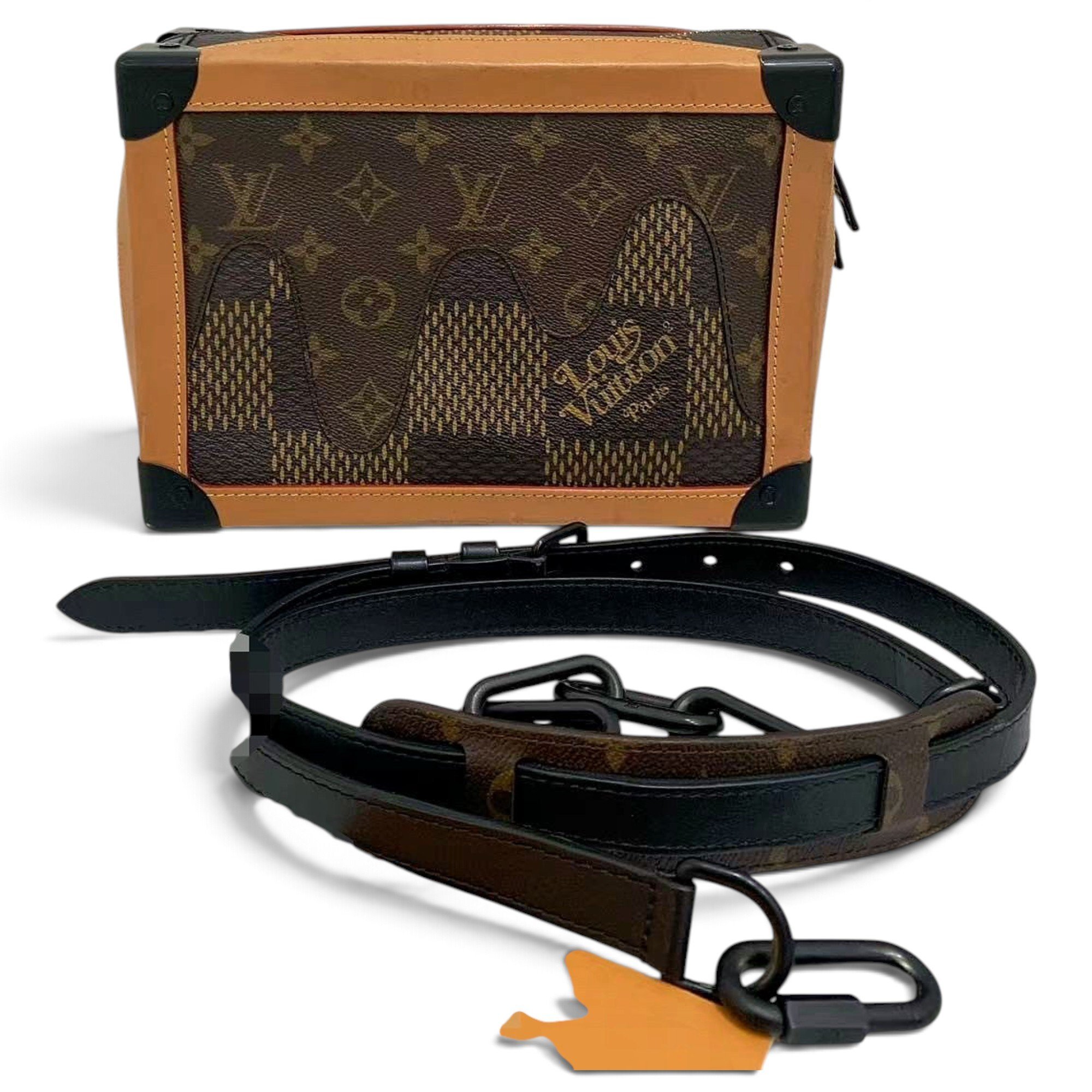 Pochette Trunk leather handbag