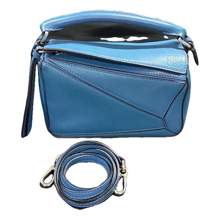Puzzle leather handbag