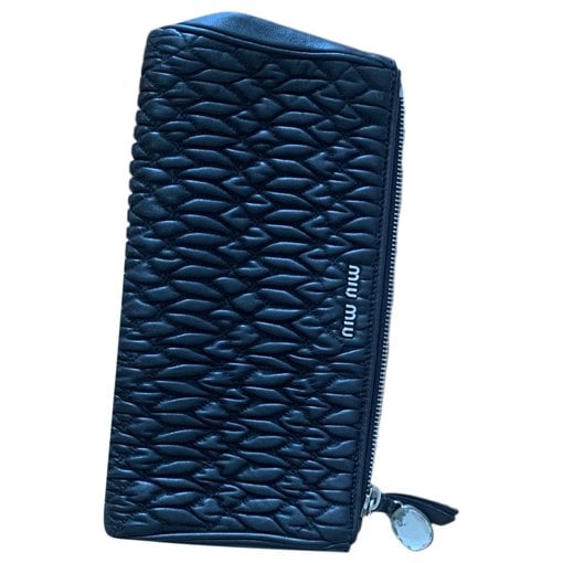 Matelassé leather clutch bag