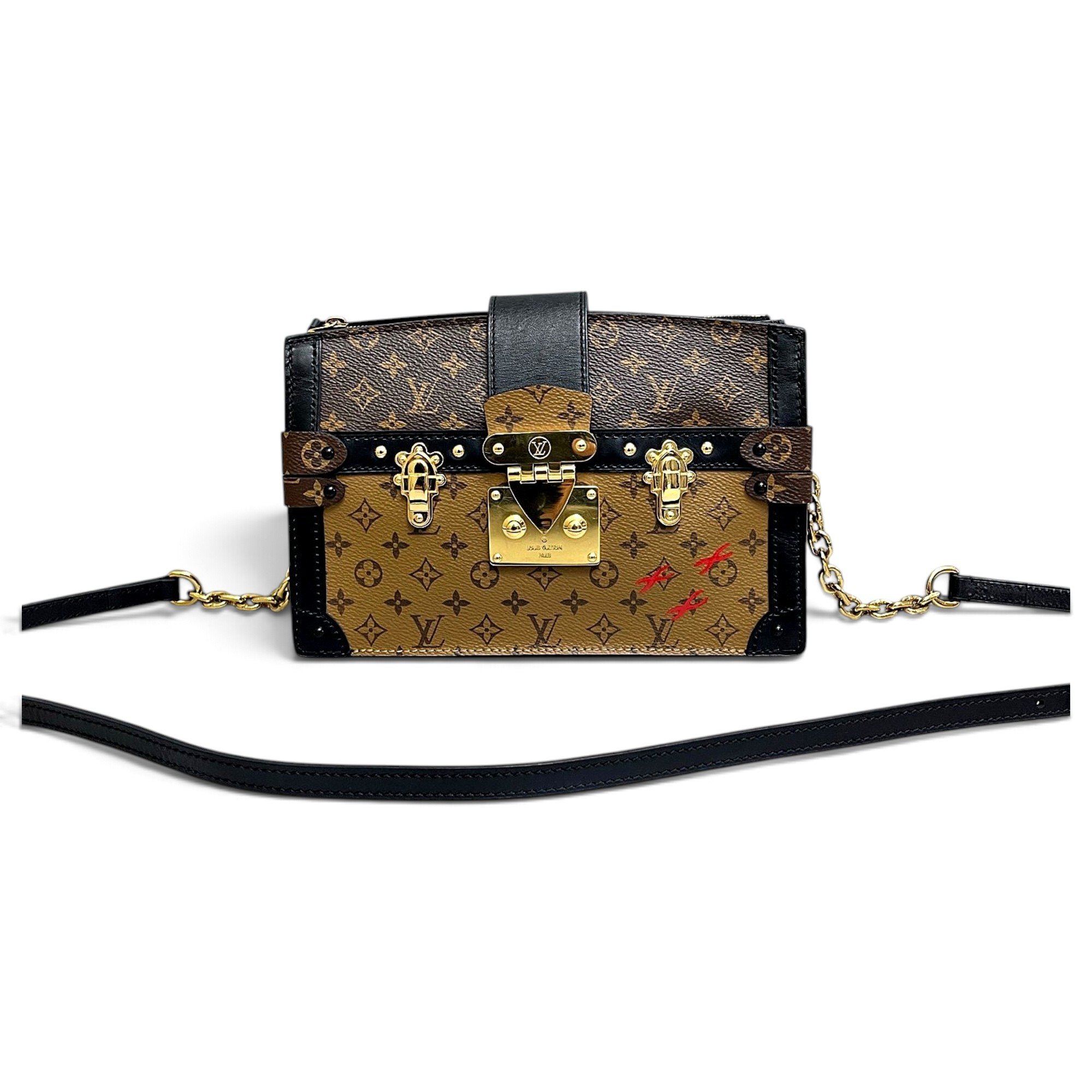 Pochette Trunk leather handbag