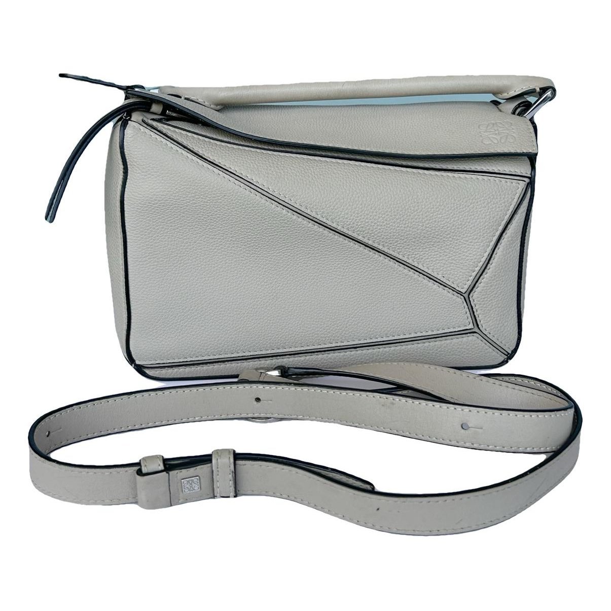 Puzzle leather handbag
