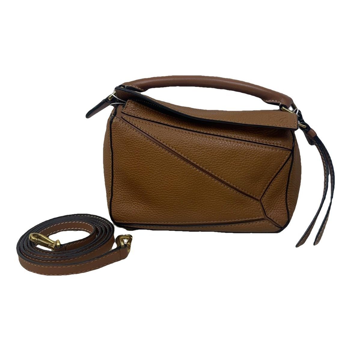 Puzzle leather handbag