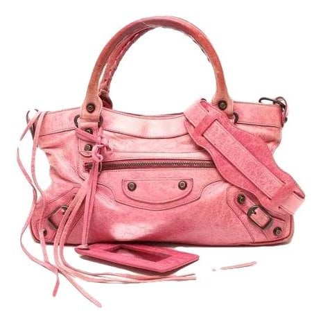 First leather handbag