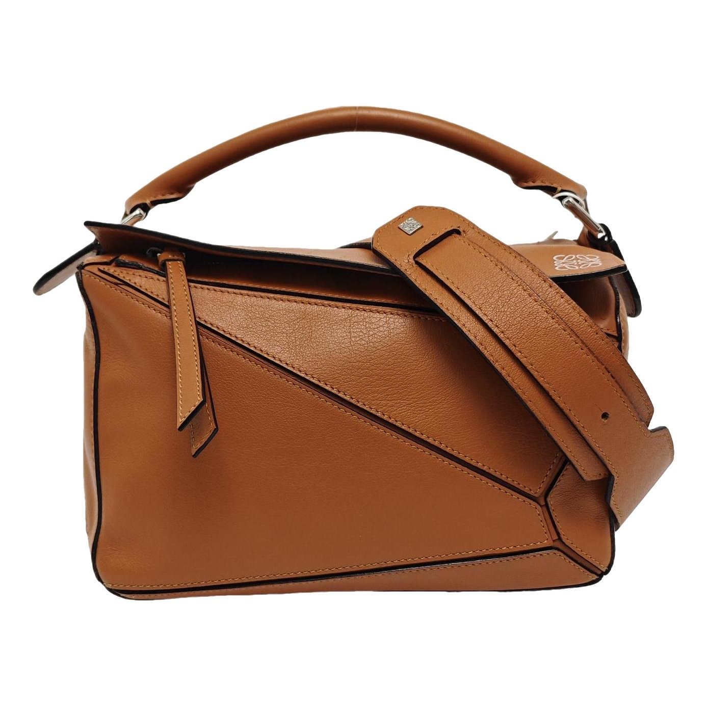 Puzzle leather handbag