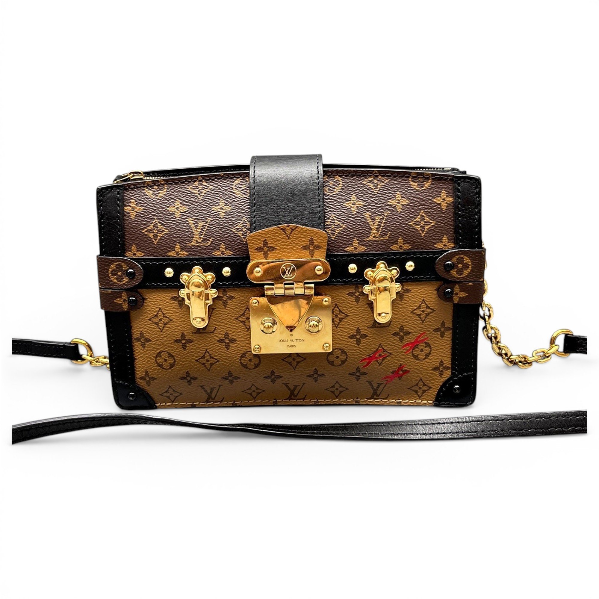 Pochette Trunk leather handbag