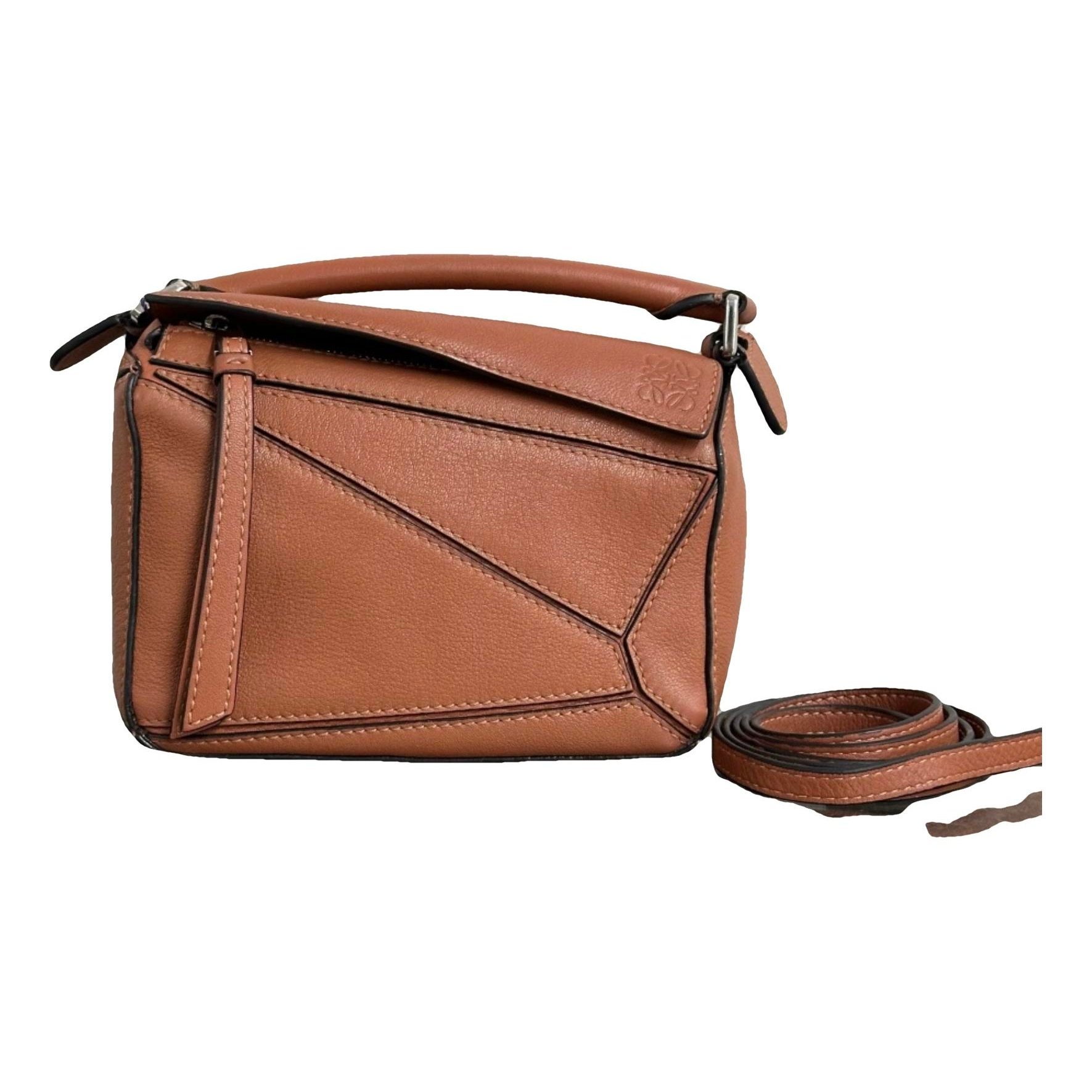 Puzzle leather handbag