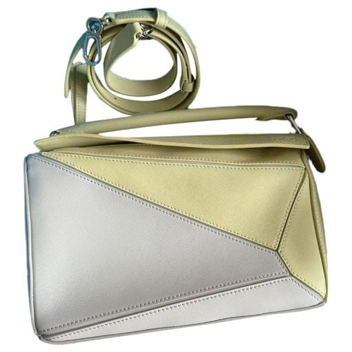 Puzzle leather handbag