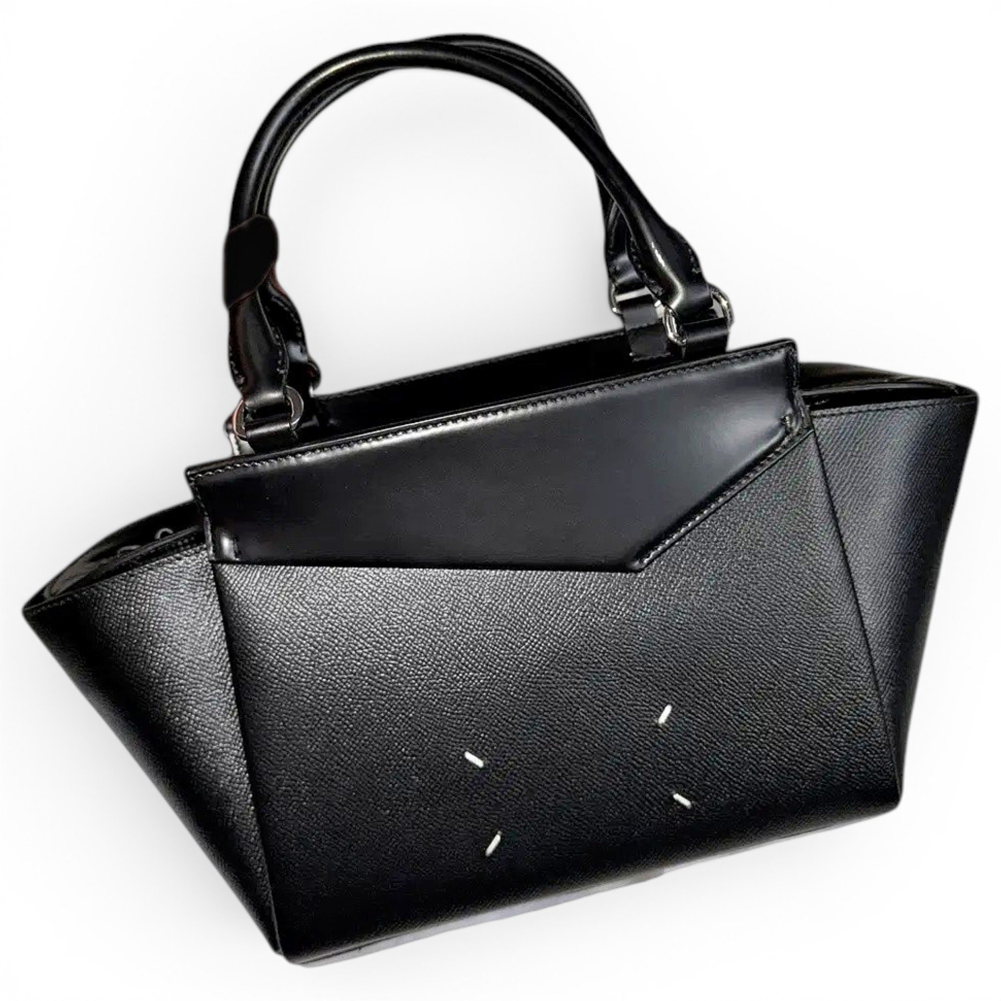 Snatched leather handbag