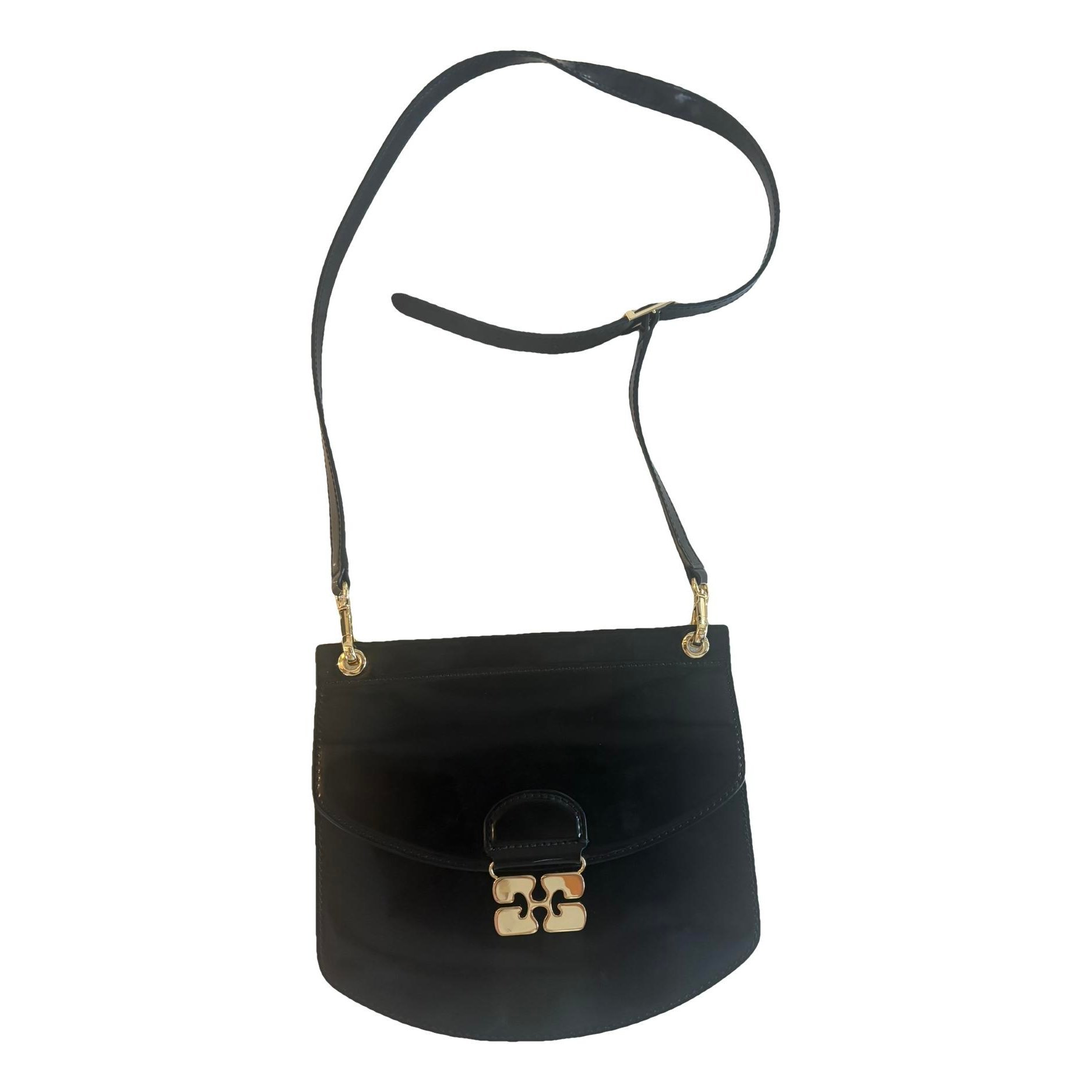 Apo-G patent leather handbag