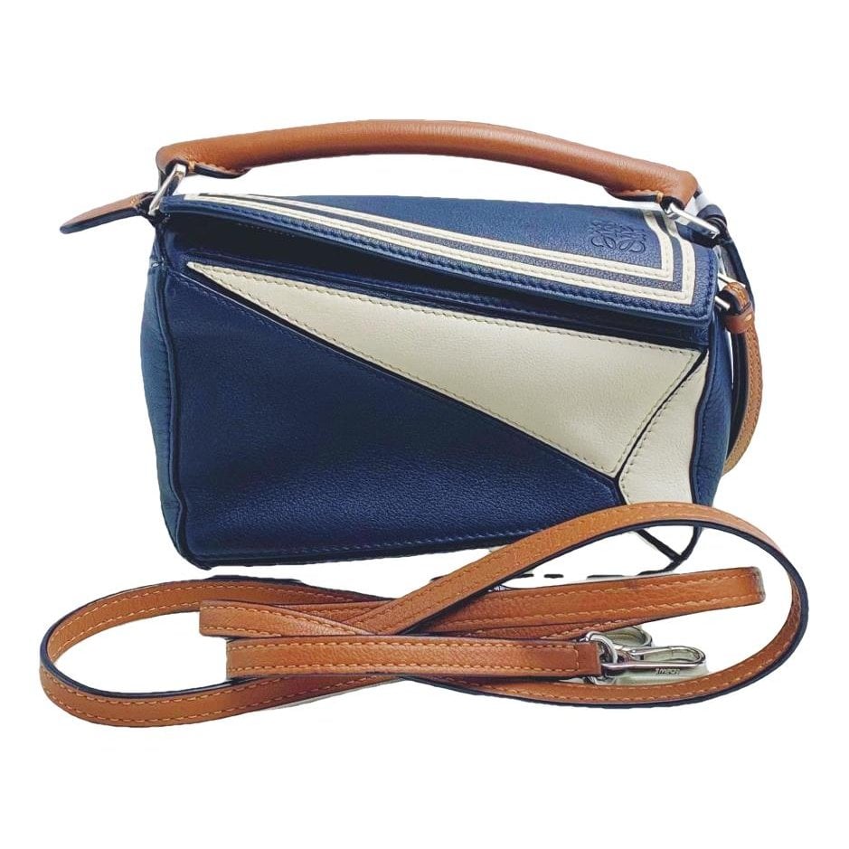 Puzzle leather handbag