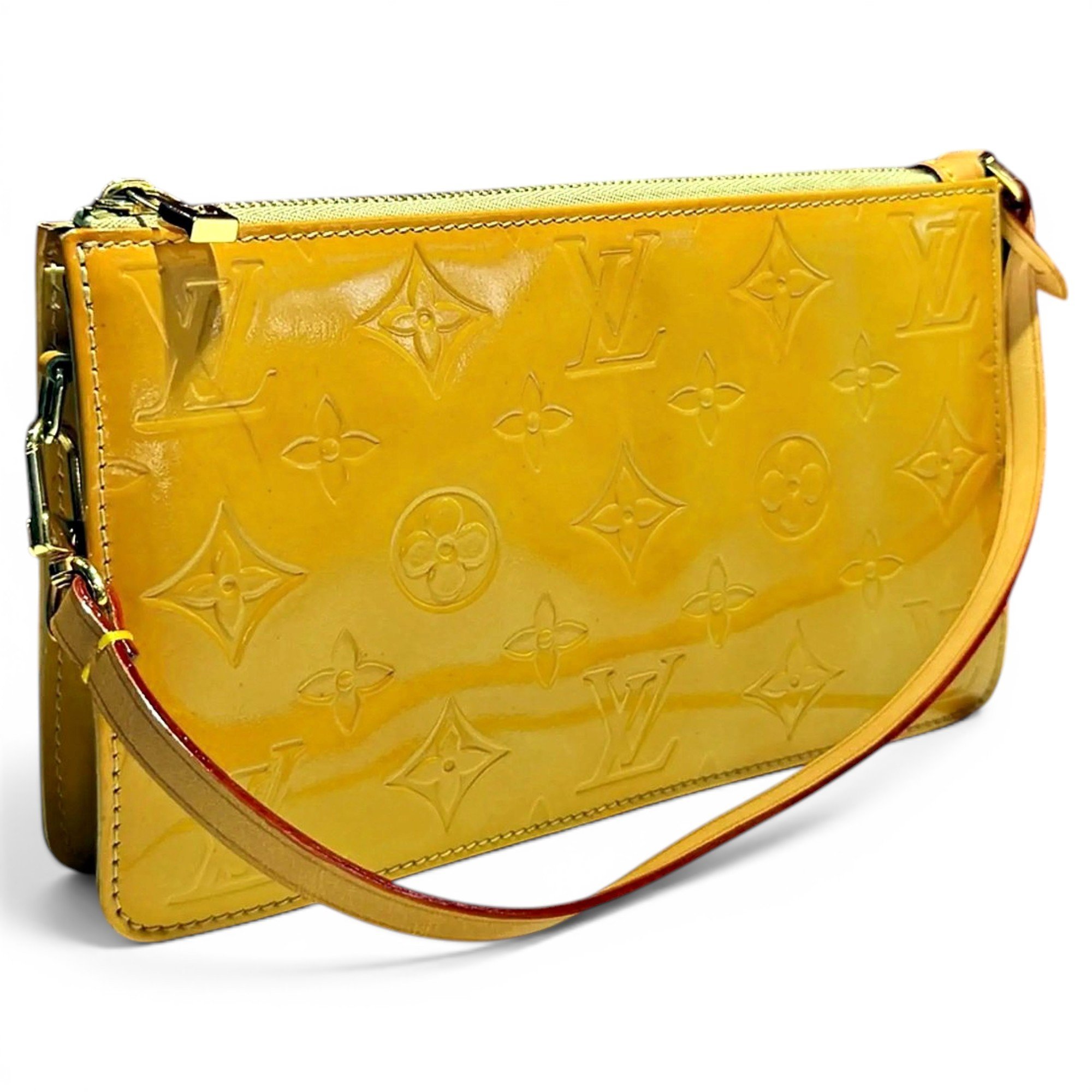 Pochette Accessoire patent leather handbag